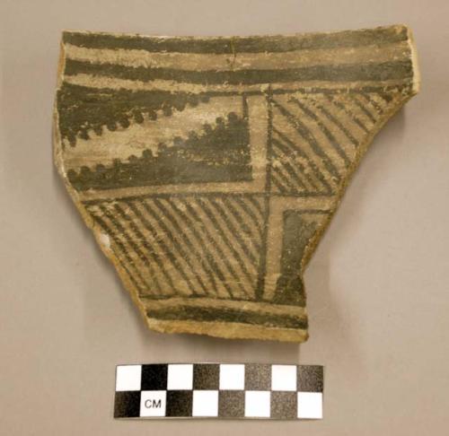 Rim sherd, bowl, mended, black geometric designs on interior