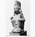 Aztec seated stone figure
