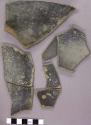Pockmarked black slip wall sherds from utilized vessel