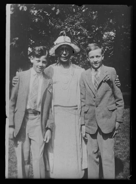 Portrait of woman and two boys