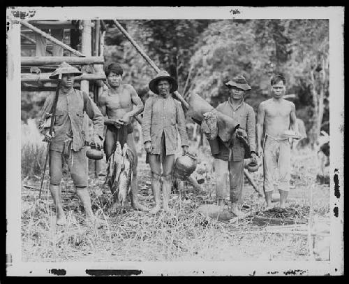 Men carrying supplies