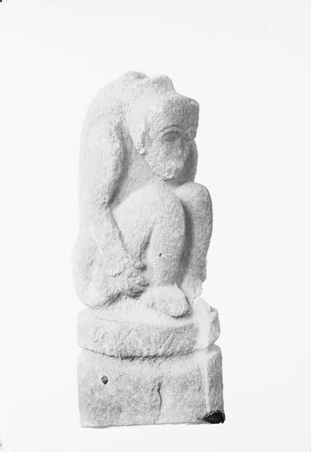 Crouched human stone figure from Michigan