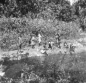 Natives washing clothes in the Sipi river