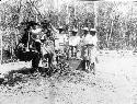 Copy of a print of Dr. Tozzer, diver preparing to go below surface of cenote