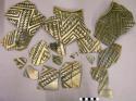 Black on white sherds from jar with exterior geometric design