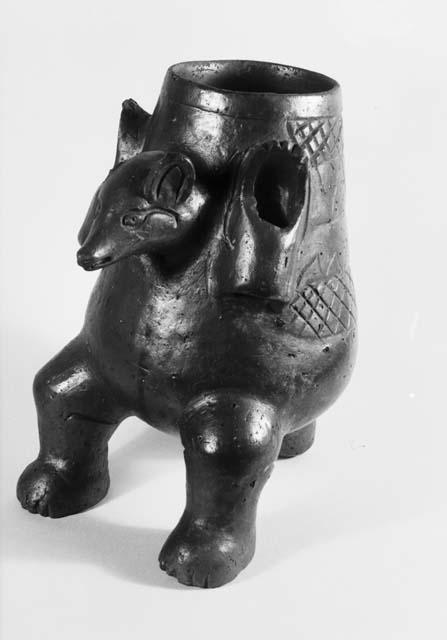 Vase ornamented with animal head