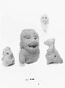 Four pottery figurines