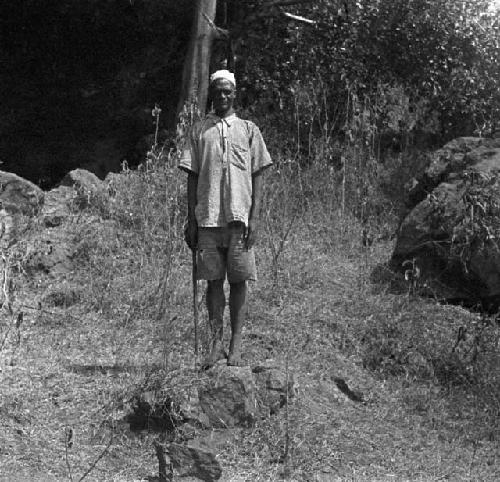 Masai boy in front of cave at Elgonyi