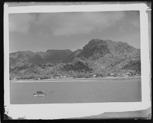 Canoe in general view of landscape and water