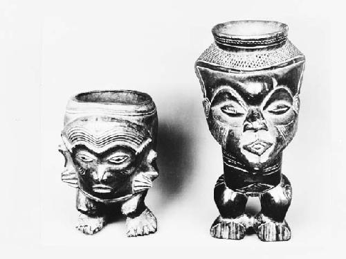 Two effigy vessels with faces