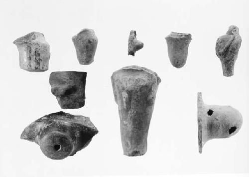 Miscellaneous pottery legs, fragmentary effigy handle