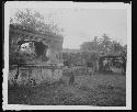 Man next to ruins in jungle setting