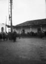 Crowd gathered below ladder to view Voladores performers