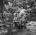 Children who come daily to fill gourds at the stream