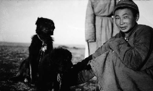 Lama with two dogs at Dilowa's