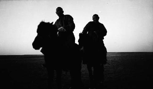 Gendung and friend on horseback