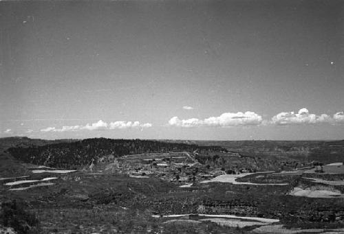 Landscape with hills, river and cultivated fields