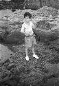 David Lattimore standing on rock near water