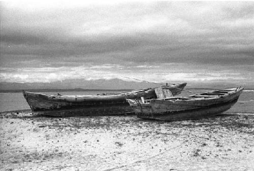 Boats by seashore