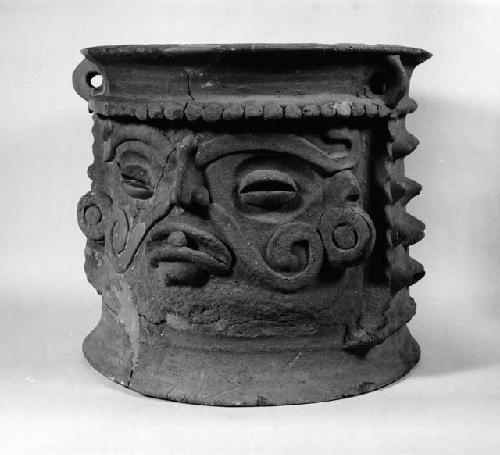 Large jar of coarse ware, human face in relief on one side