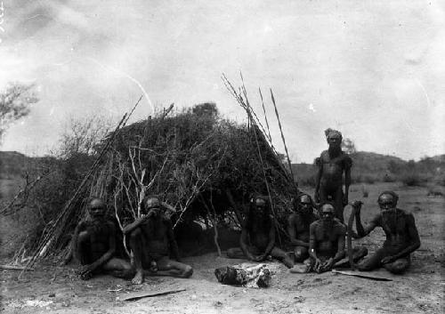 Group of old Arunta men seated at Wurley