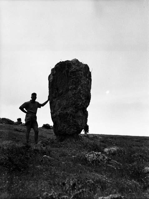 Dennis Battan beside Menhir at Barda Balkha