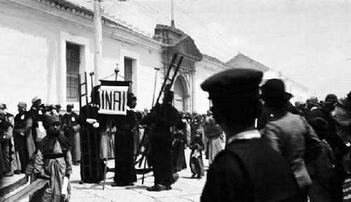 Holy Week procession, ladders and sign