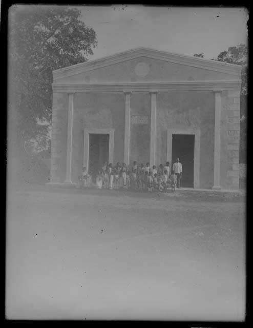 Children in front of Building