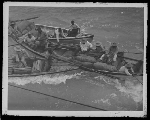 Men in canoes