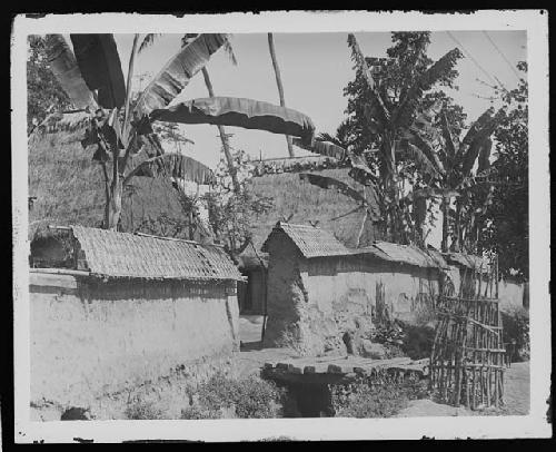 Buildings and hut in rural setting