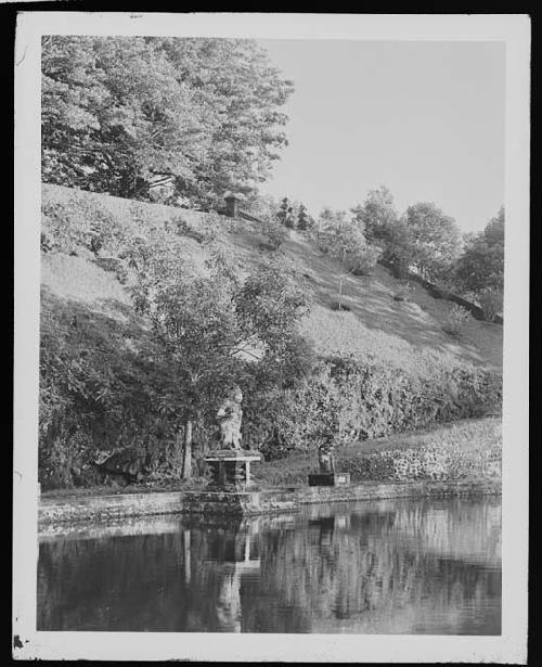 Statue next to water