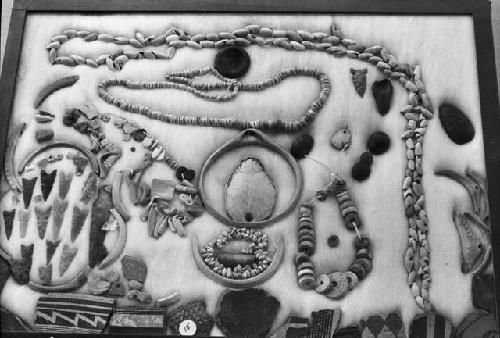 Stone point, stone and bone beads and pendants, rim sherds, from Ceremonial Cave