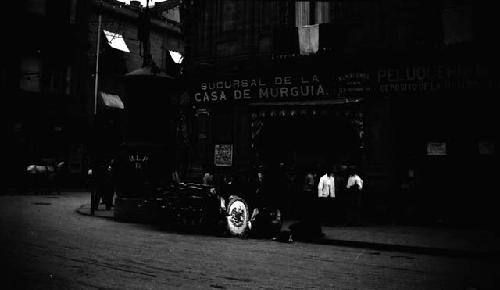 Crowd standing in front of building