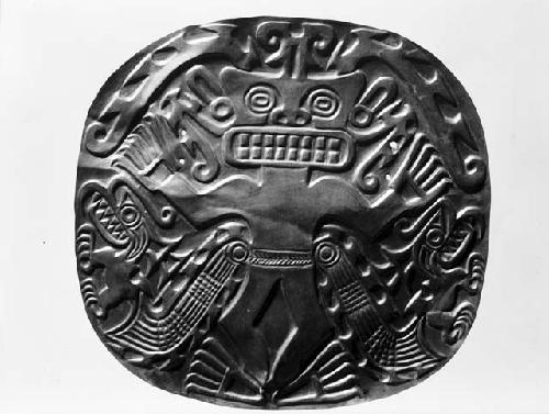 Gold disk with repousse design representing the crocodile god from grave 26