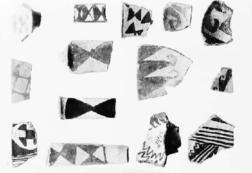 Black on white potsherds from Pueblo II levels showing use of triangle as design