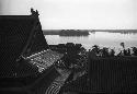 Rooftops with lake beyond