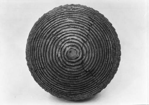 Lower half of Pueblo II corrugated pottery jar, Site 12, Refuse, burial 1