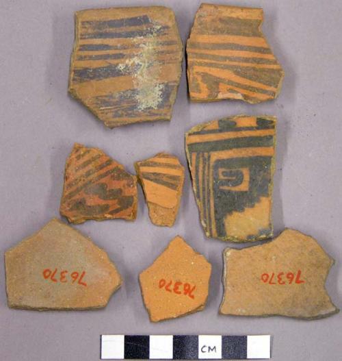 Black on orange sherds with geometric interior design, possibly from one bowl