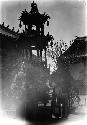 Two men in front of pagoda