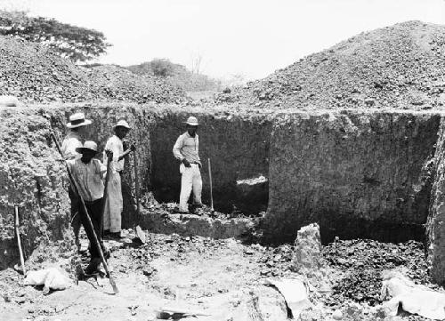 Excavation 1-31; Grave 1E extension.View of site showing tools and diggers