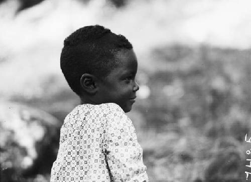 Profile view of young mixed race African child