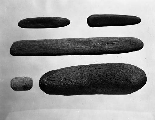 Stone pestles from rooms 52, 59, and 37