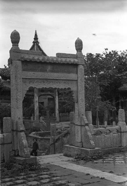 Carved stone gateway to complex of stairs and terraces