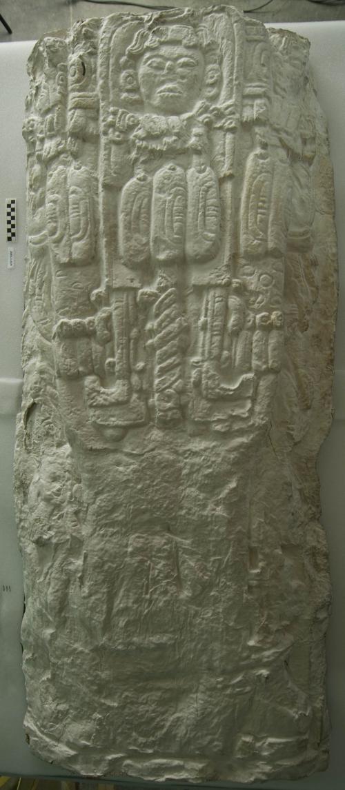 Cast of part of Stela P, lower half of figure