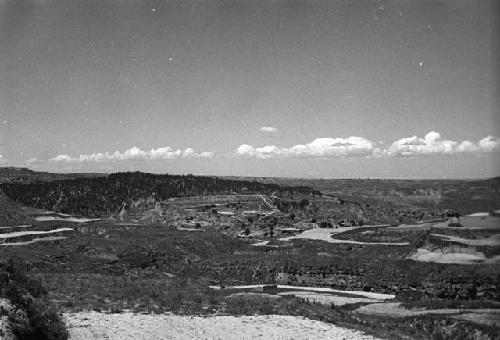 Landscape with hills, river and cultivated fields