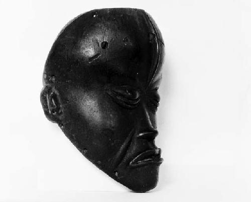 African sculpture, mask, side view