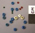 Tiny colored glass beads, round