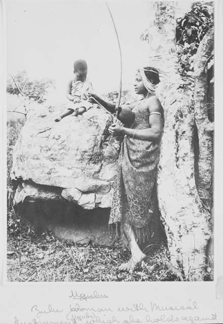 Photograph of a Zulu woman playing a musical instrument