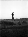 Marshal Chang Hsuch-Liang after driving off, playing golf