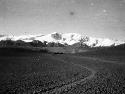 Depsang Plains, vast plain with caravan in far distance and mountains